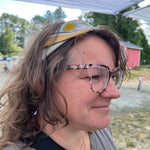 Women's silk scarf worn in hair